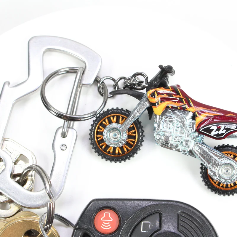 porte-clés moto élégant et robuste, parfait pour les passionnés de deux-roues. un accessoire pratique et stylé pour garder vos clés toujours à portée de main.