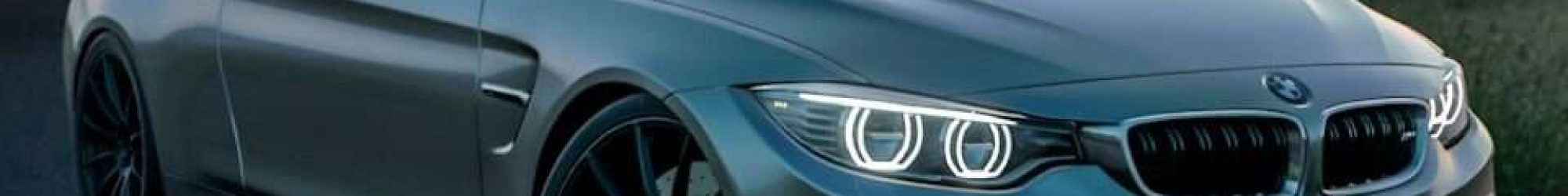 gray mercedes benz coupe on black asphalt road during daytime